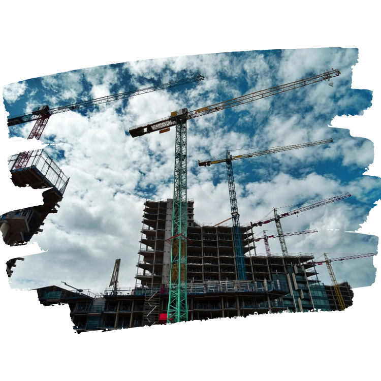 a construction site with large cranes