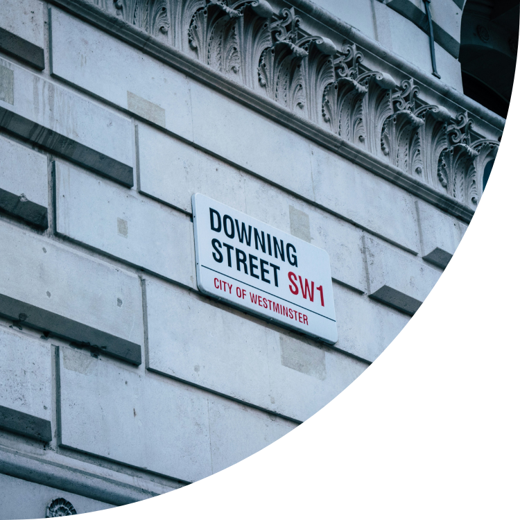 a street sign showing Downing Street London