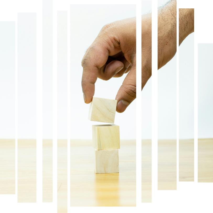 a person stacking blocks