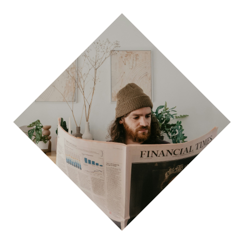 person looking at financial times for finance advice